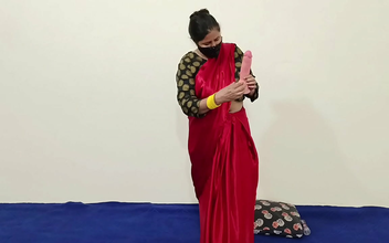 Enchanting Indian Aunty Pleasures Herself with Huge Dildo in Saree