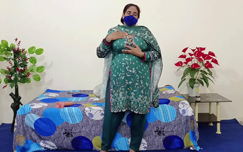 Witness the Ecstasy of a Desi Aunty's Orgasm with a Dildo